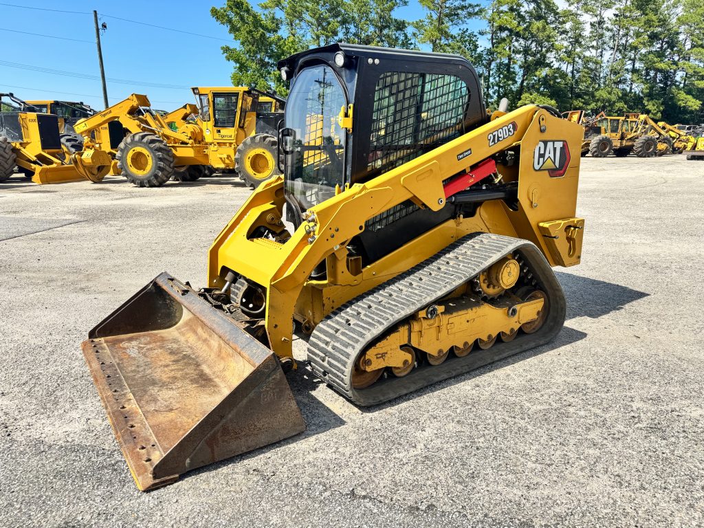 For Sale: Used 2022 Cat 279D3 skid steer in South Carolina. Features an enclosed cab, forks, and bucket. Work-ready and reliable.