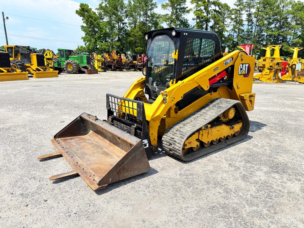 For Sale: Used 2022 Cat 279D3 skid steer in South Carolina. Features an enclosed cab, forks, and bucket. Work-ready and reliable.